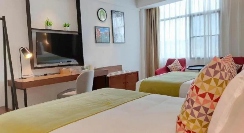 Bed in Campanile Hotel Shenzhen Bay Convention and Exhibition Center