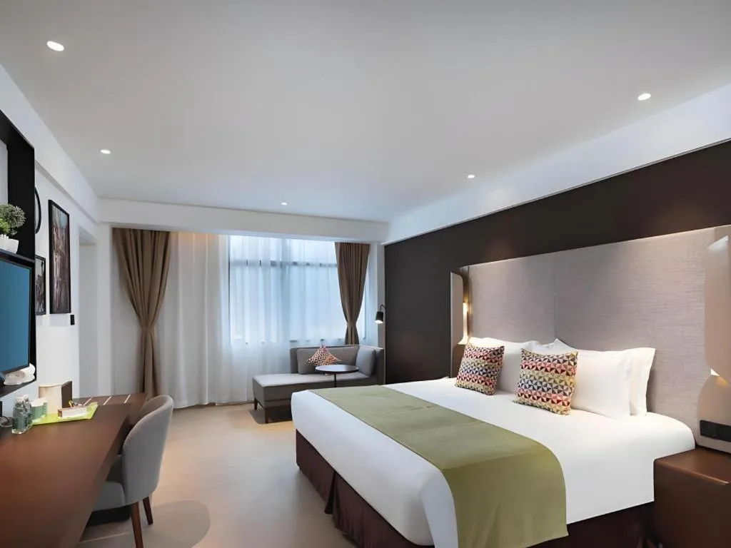 Bed in Campanile Hotel Shenzhen Bay Convention and Exhibition Center