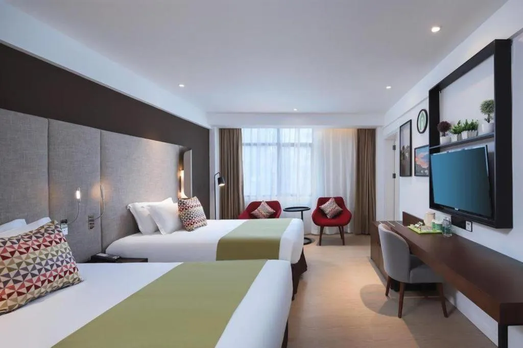 Bed in Campanile Hotel Shenzhen Bay Convention and Exhibition Center