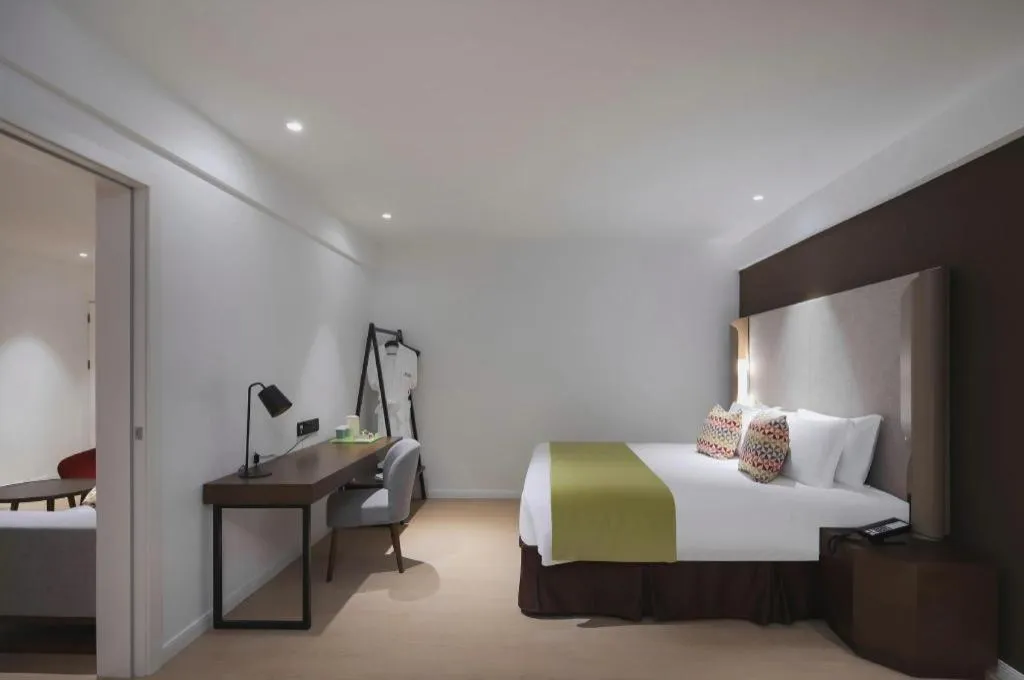 Bed in Campanile Hotel Shenzhen Bay Convention and Exhibition Center