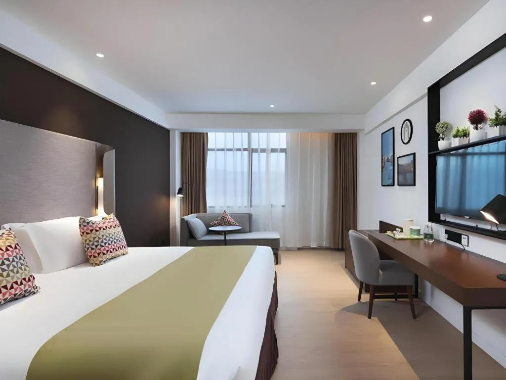 Bed in Campanile Hotel Shenzhen Bay Convention and Exhibition Center