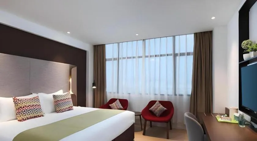 Bed in Campanile Hotel Shenzhen Bay Convention and Exhibition Center