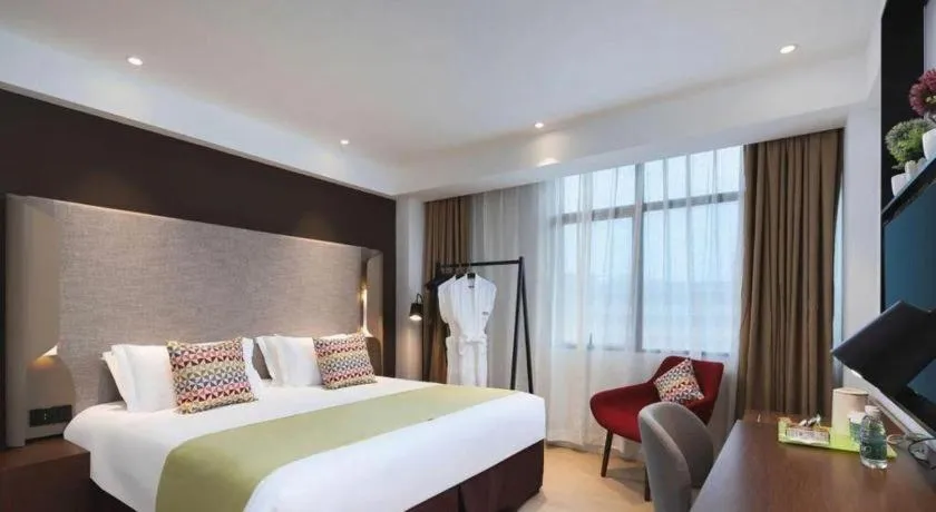 Bed in Campanile Hotel Shenzhen Bay Convention and Exhibition Center