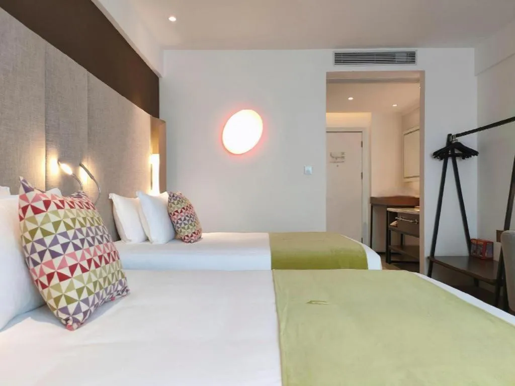 Bed in Campanile Hotel Shenzhen Bay Convention and Exhibition Center