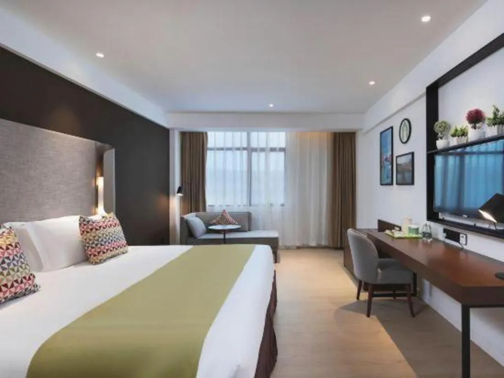 Bed in Campanile Hotel Shenzhen Bay Convention and Exhibition Center