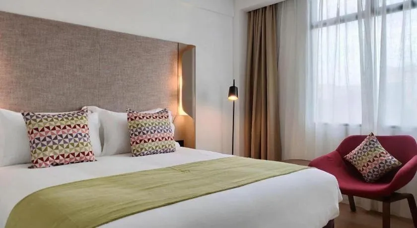 Bed in Campanile Hotel Shenzhen Bay Convention and Exhibition Center