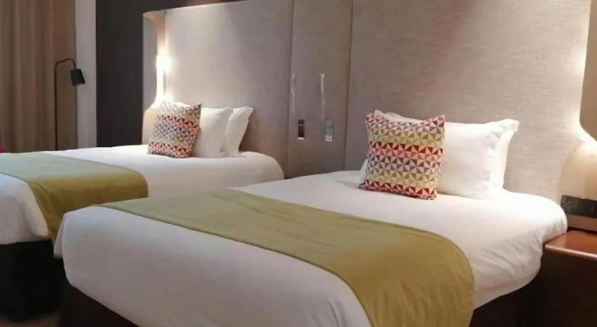 Bed in Campanile Hotel Shenzhen Bay Convention and Exhibition Center