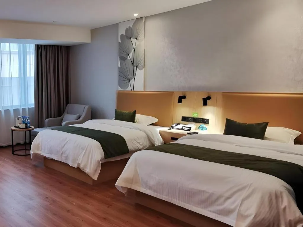 Bed in GreenTree Inn Express Fuzhou Le'an County Government Sijiu Square