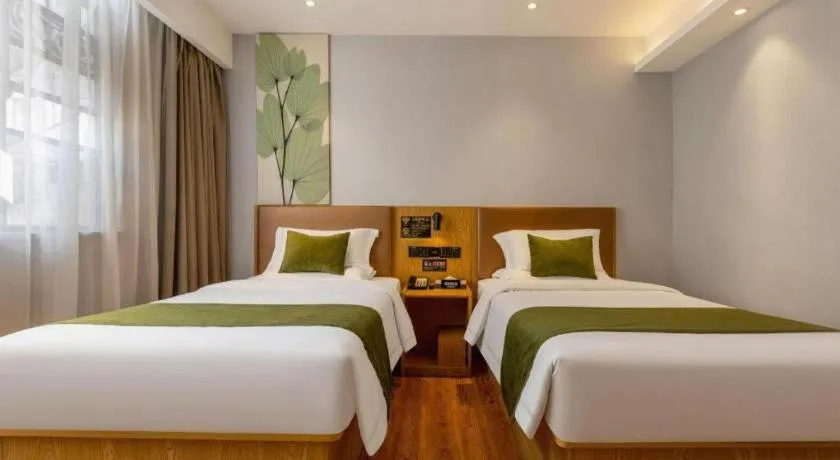 Bed in GreenTree Inn Express Fuzhou Le'an County Government Sijiu Square