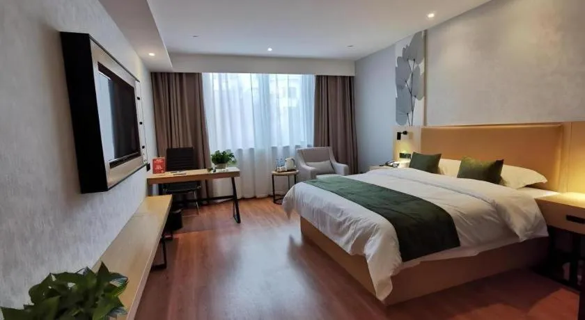 Bed in GreenTree Inn Express Fuzhou Le'an County Government Sijiu Square