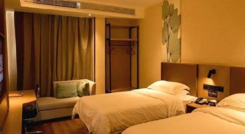 Bed in GreenTree Inn Express Fuzhou Le'an County Government Sijiu Square