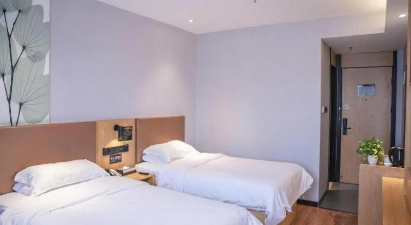 Bed in GreenTree Inn Express Fuzhou Le'an County Government Sijiu Square