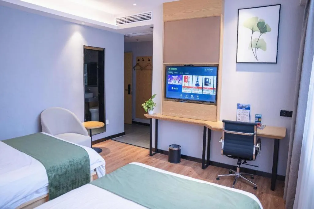 Bed in GreenTree Inn Express Fuzhou Le'an County Government Sijiu Square