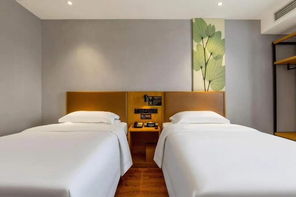 Bed in GreenTree Inn Express Fuzhou Le'an County Government Sijiu Square