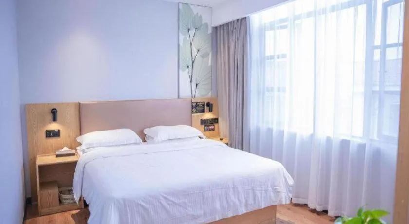 Bed in GreenTree Inn Express Fuzhou Le'an County Government Sijiu Square