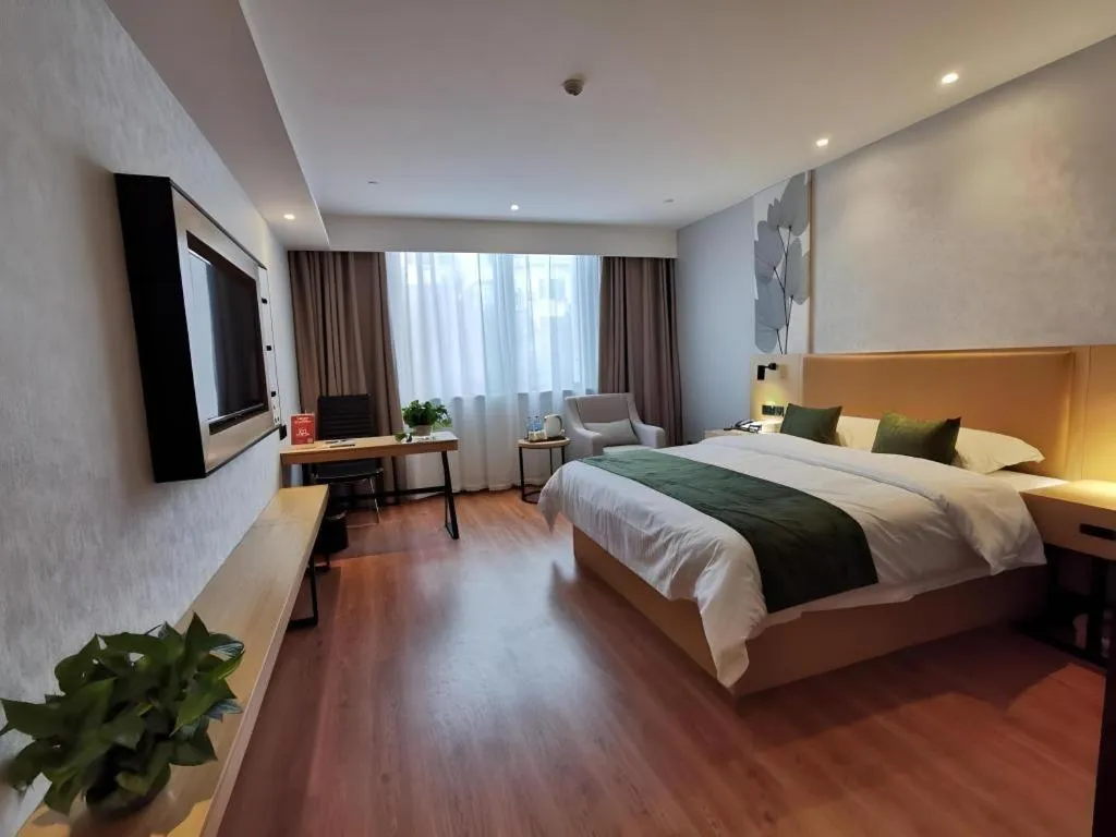 Bed in GreenTree Inn Express Fuzhou Le'an County Government Sijiu Square