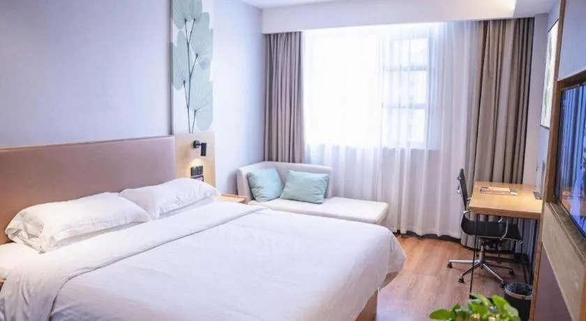 Bed in GreenTree Inn Express Fuzhou Le'an County Government Sijiu Square