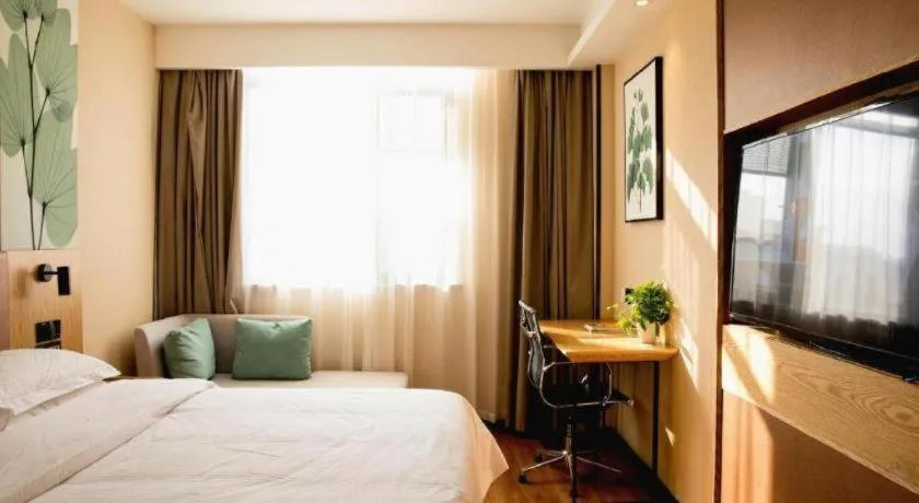 Bed in GreenTree Inn Express Fuzhou Le'an County Government Sijiu Square