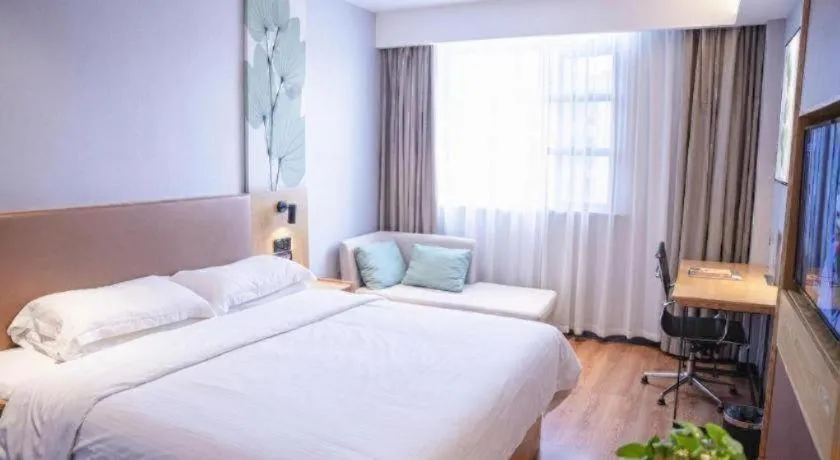 Bed in GreenTree Inn Express Fuzhou Le'an County Government Sijiu Square