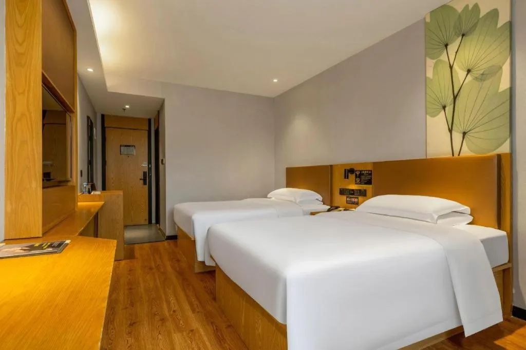 Bed in GreenTree Inn Express Fuzhou Le'an County Government Sijiu Square