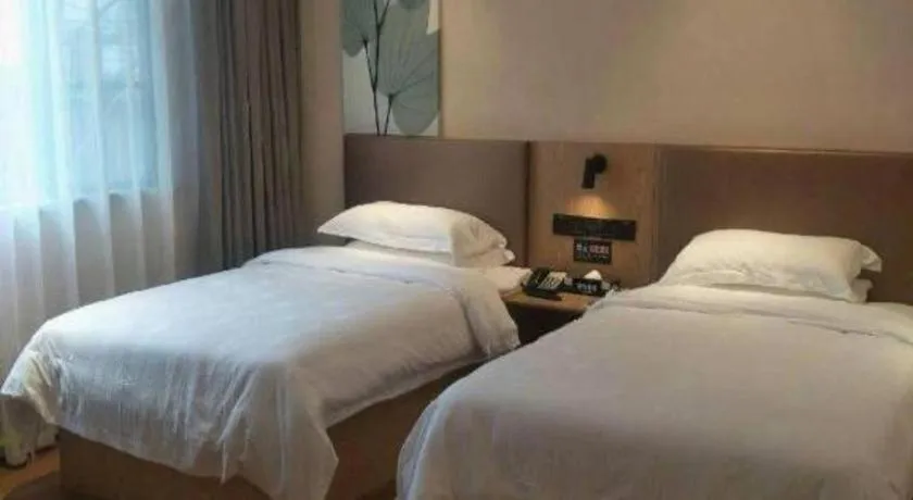 Bed in GreenTree Inn Express Fuzhou Le'an County Government Sijiu Square