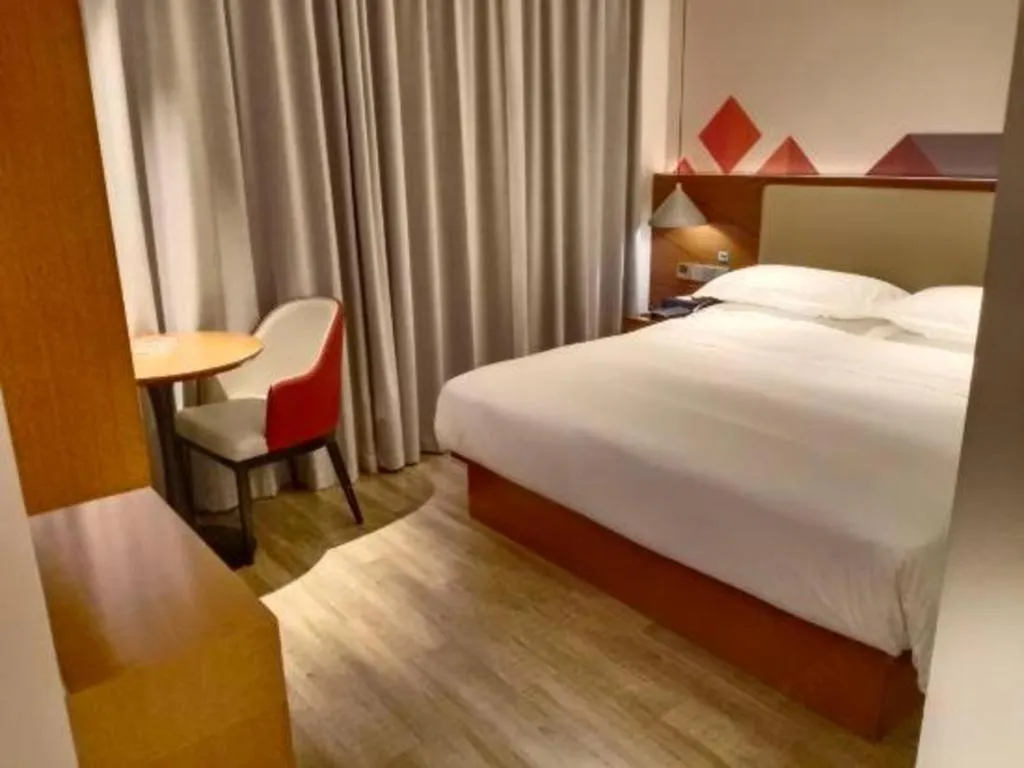 Bed in Borrman Hotel Guangzhou Southern Hospital Meihuayuan Metro Station