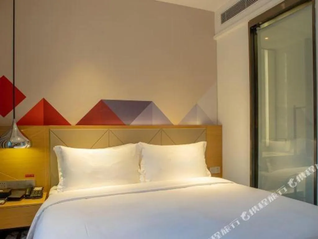 Bed in Borrman Hotel Guangzhou Southern Hospital Meihuayuan Metro Station