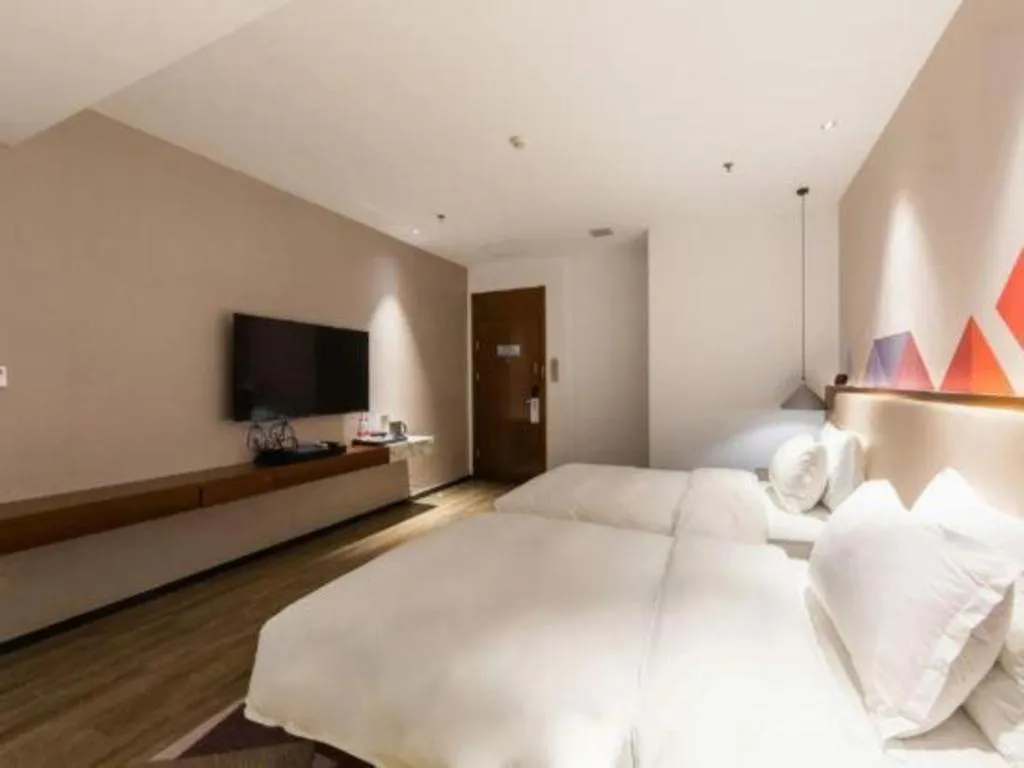 Bed in Borrman Hotel Guangzhou Southern Hospital Meihuayuan Metro Station