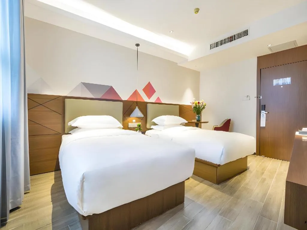 Bed in Borrman Hotel Guangzhou Southern Hospital Meihuayuan Metro Station