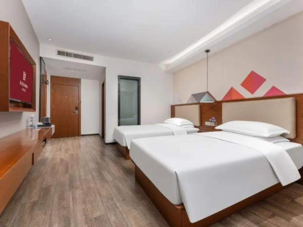 Bed in Borrman Hotel Guangzhou Southern Hospital Meihuayuan Metro Station