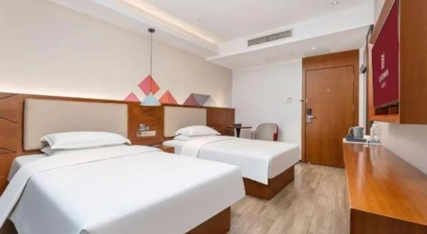 Bed in Borrman Hotel Guangzhou Southern Hospital Meihuayuan Metro Station