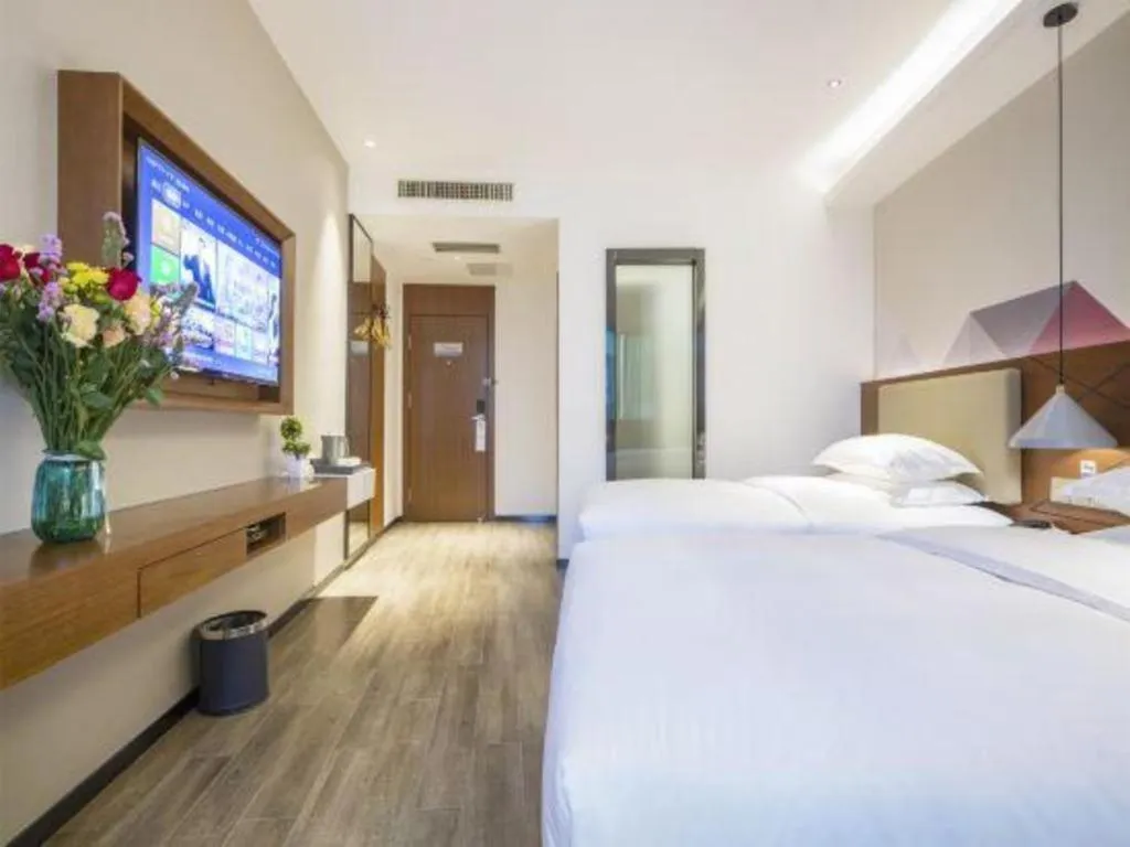 Bed in Borrman Hotel Guangzhou Southern Hospital Meihuayuan Metro Station