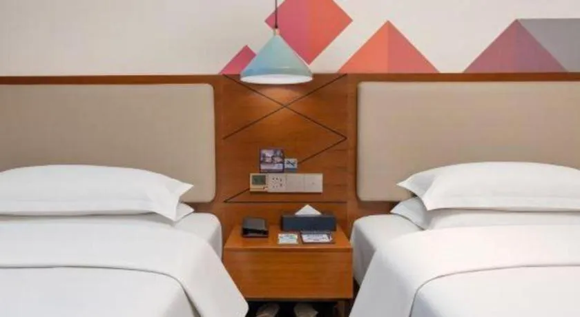 Bed in Borrman Hotel Guangzhou Southern Hospital Meihuayuan Metro Station