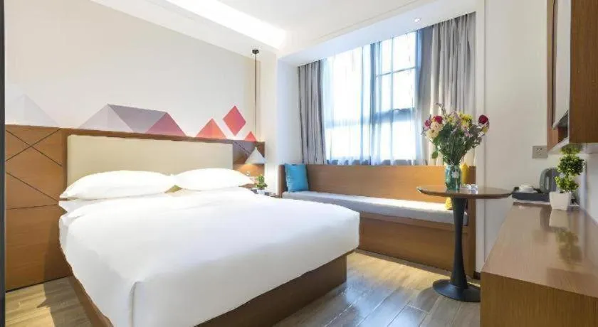 Bed in Borrman Hotel Guangzhou Southern Hospital Meihuayuan Metro Station