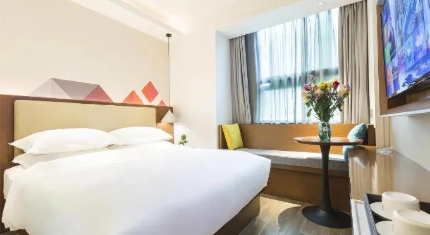 Bed in Borrman Hotel Guangzhou Southern Hospital Meihuayuan Metro Station