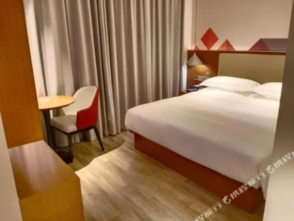 Bed in Borrman Hotel Guangzhou Southern Hospital Meihuayuan Metro Station