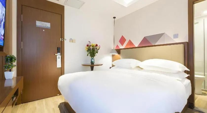 Bed in Borrman Hotel Guangzhou Southern Hospital Meihuayuan Metro Station