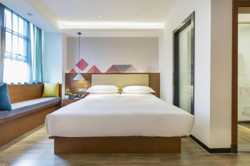 Bed in Borrman Hotel Guangzhou Southern Hospital Meihuayuan Metro Station