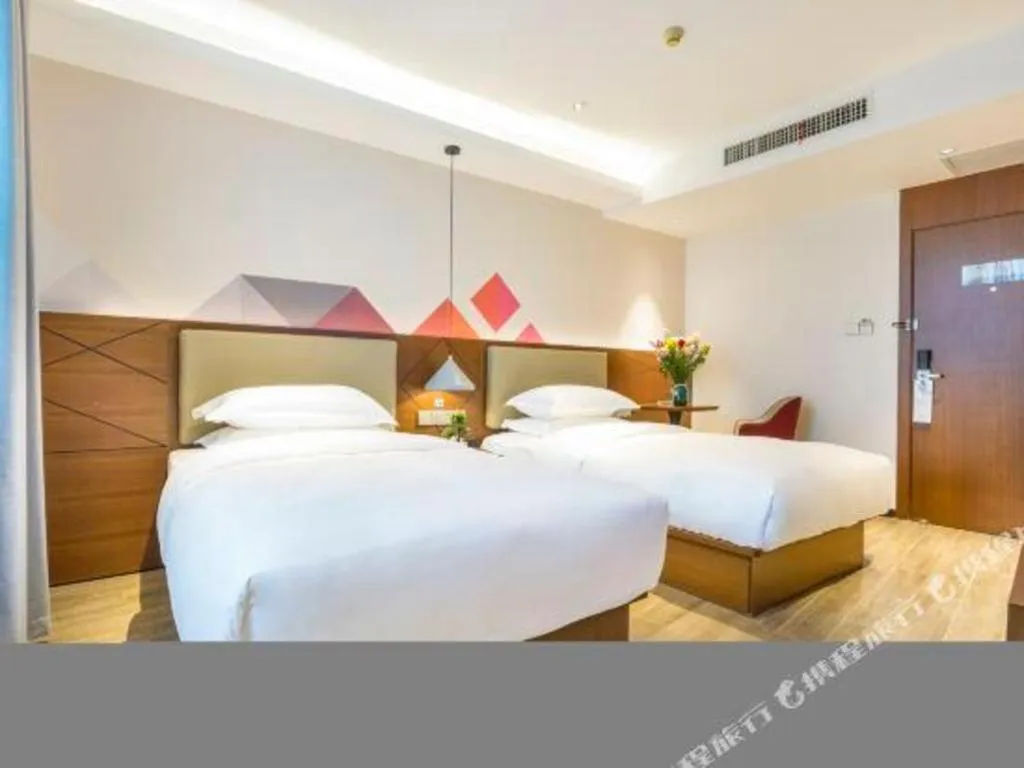 Bed in Borrman Hotel Guangzhou Southern Hospital Meihuayuan Metro Station