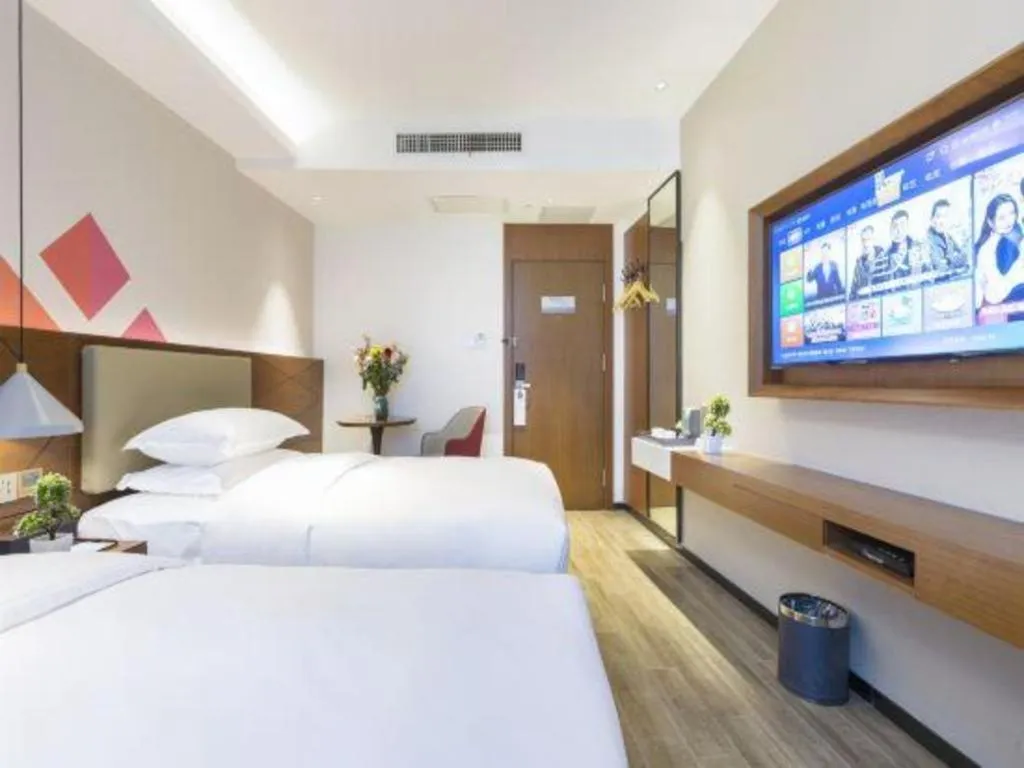 Bed in Borrman Hotel Guangzhou Southern Hospital Meihuayuan Metro Station