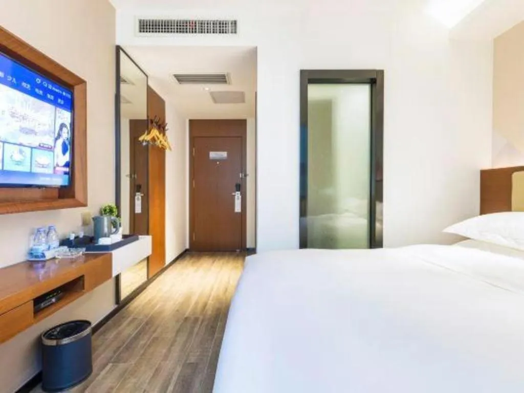 Bed in Borrman Hotel Guangzhou Southern Hospital Meihuayuan Metro Station