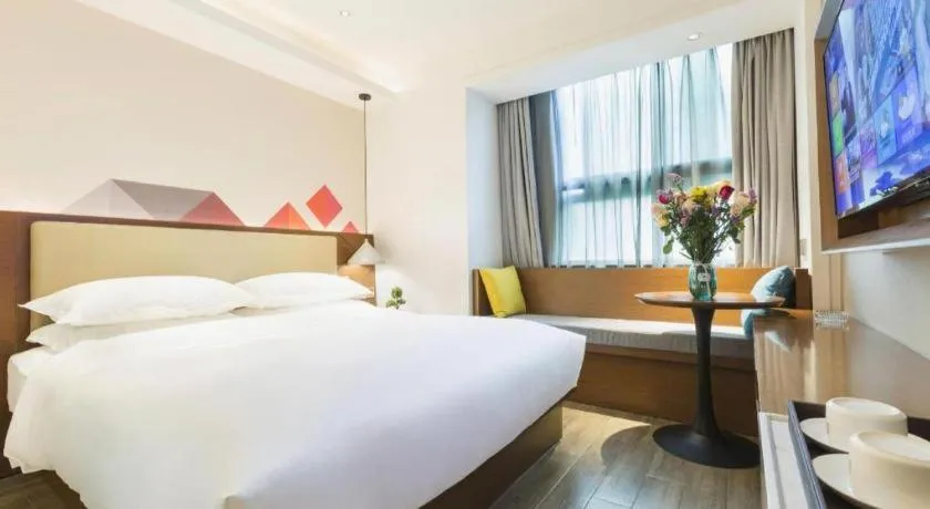 Bed in Borrman Hotel Guangzhou Southern Hospital Meihuayuan Metro Station