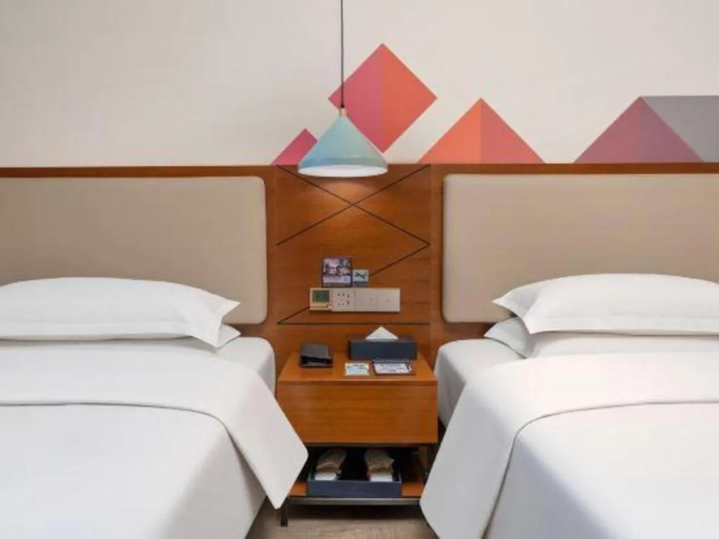 Bed in Borrman Hotel Guangzhou Southern Hospital Meihuayuan Metro Station