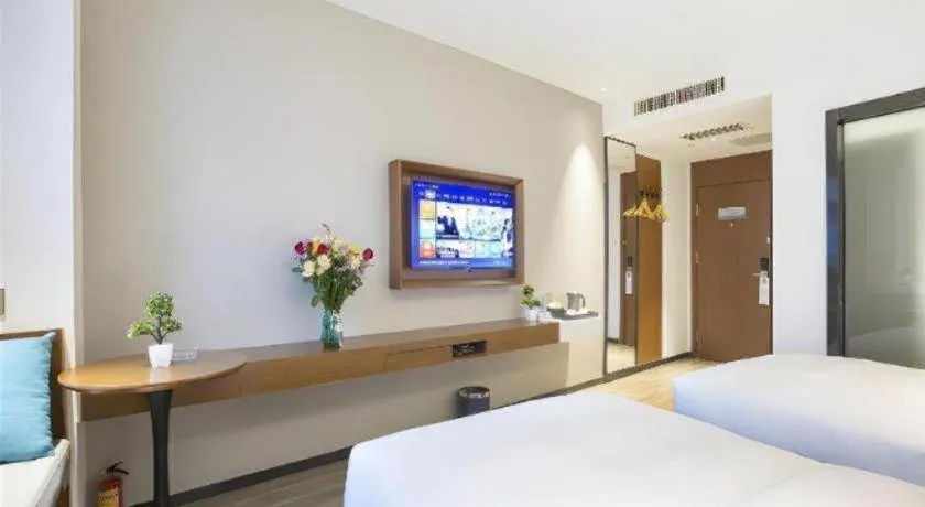 Bed in Borrman Hotel Guangzhou Southern Hospital Meihuayuan Metro Station