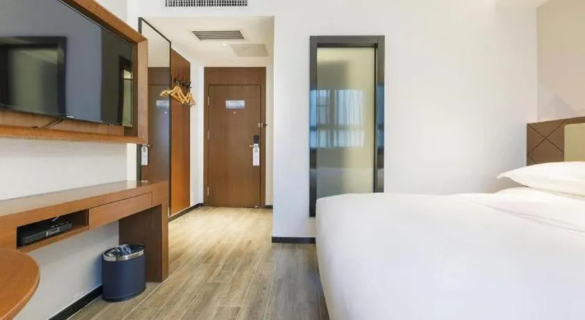 Bed in Borrman Hotel Guangzhou Southern Hospital Meihuayuan Metro Station