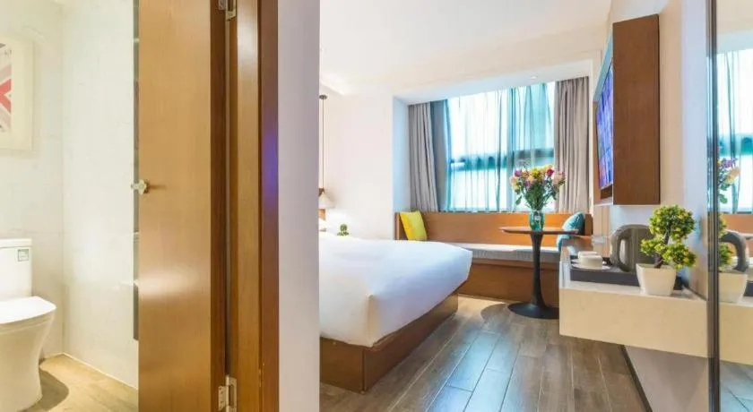 Bed in Borrman Hotel Guangzhou Southern Hospital Meihuayuan Metro Station