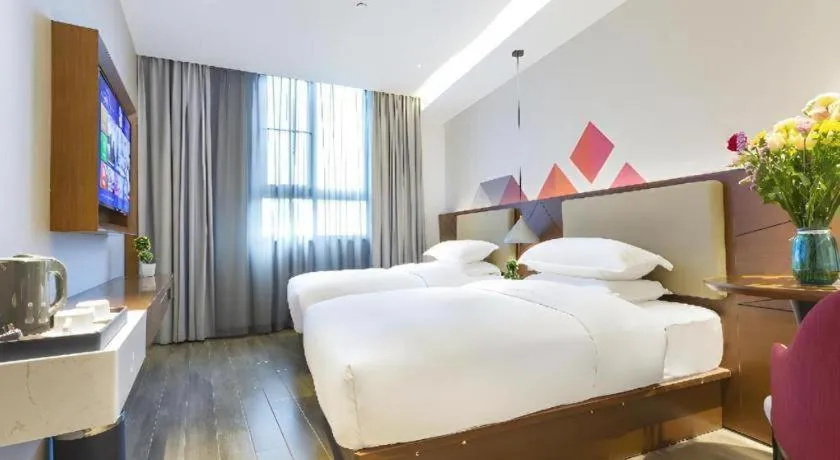 Bed in Borrman Hotel Guangzhou Southern Hospital Meihuayuan Metro Station