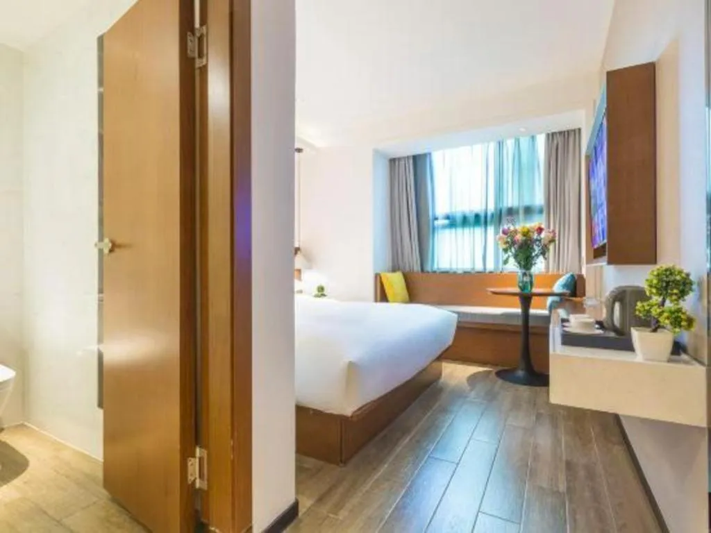 Bed in Borrman Hotel Guangzhou Southern Hospital Meihuayuan Metro Station