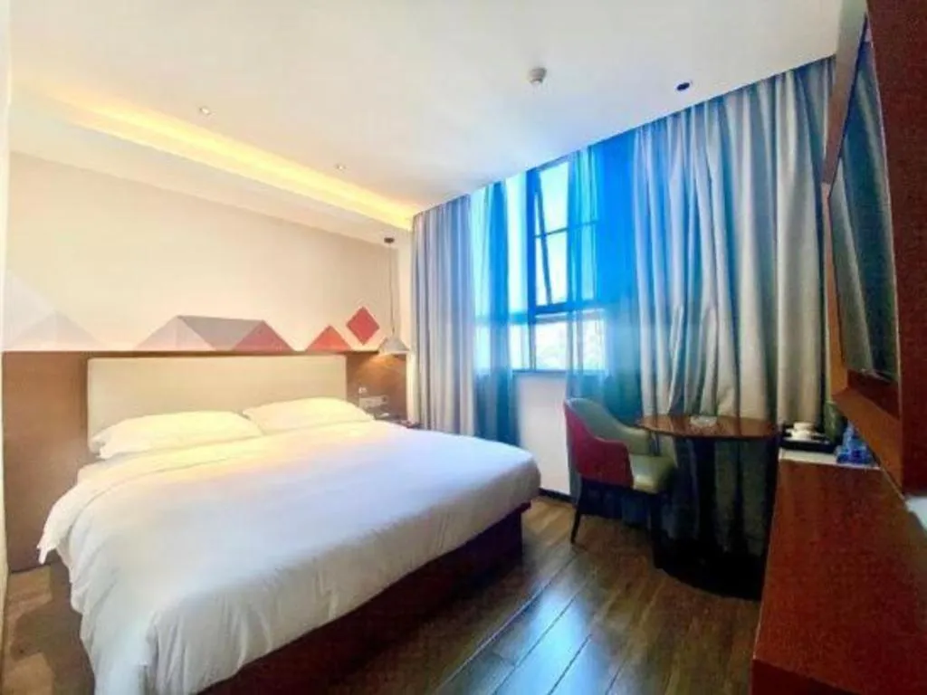 Bed in Borrman Hotel Guangzhou Southern Hospital Meihuayuan Metro Station