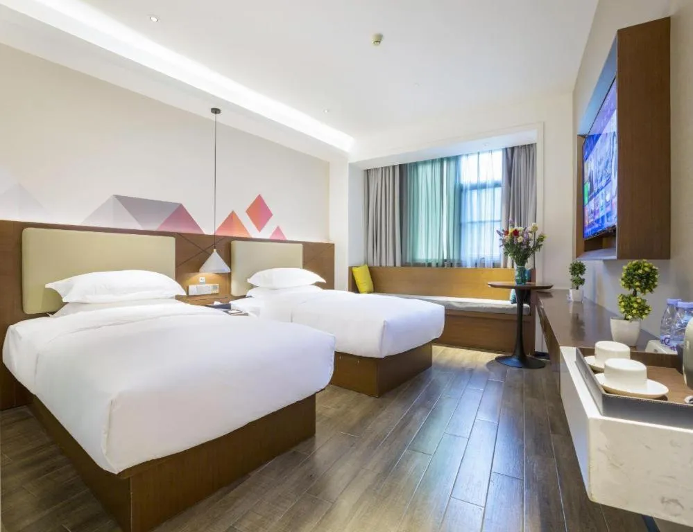 Bed in Borrman Hotel Guangzhou Southern Hospital Meihuayuan Metro Station